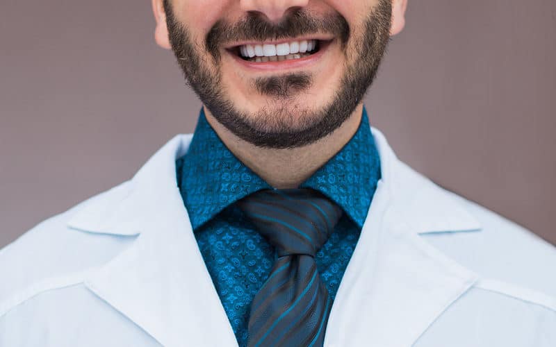 Doctor In The White Colored Apron
